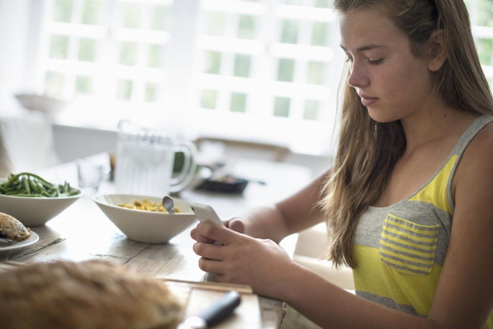 Q: My teenager is worried about gaining weight. How can I help her think more positively about food?