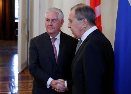 Russian Foreign Minister Sergei Lavrov shakes hands with U.S. Secretary of State Rex Tillerson during their meeting in Moscow, Russia, April 12, 2017. REUTERS/Maxim Shemetov