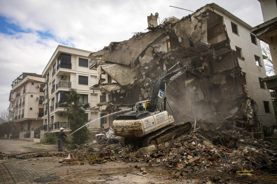 Istanbul City Hall workers demolish a building that not accomplish anti earthquake standards, in Istanbul, Turkey, Thursday, Jan. 25, 2024. On Sunday, millions of voters in Turkey head to the polls to elect mayors and administrators in local elections which will gauge President Recep Tayyip Erdogan’s popularity as his ruling party tries to win back key cities it lost five years ago. (AP Photo/Emrah Gurel)