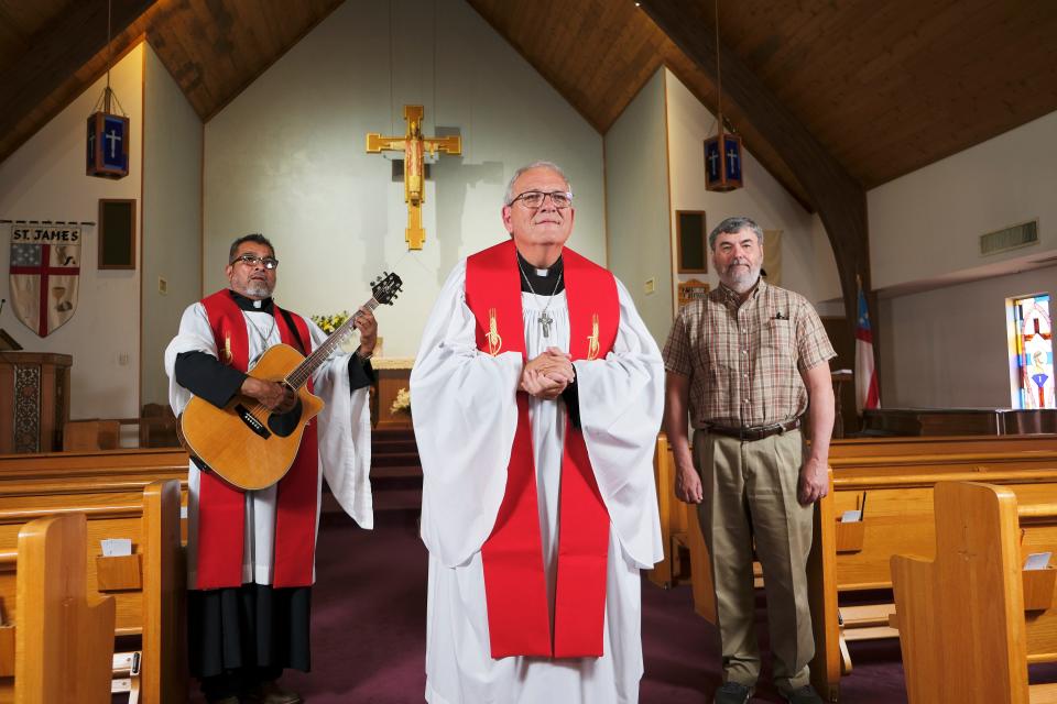 Pictured from left May 24 are: The Rev. Jose (Cuco) Escalera, associate vicar at St. James Episcopal; the Rev. Robby Trammell, vicar; and Scott Sublett, who is warden of the church. Churches that experienced a split with their denomination. A majority of St. James' congregation left the Episcopal Church USA years ago to form an Anglican church. Sublett and a small group of other people stayed and are part of the congregation that remained affiliated with the Episcopal Church.