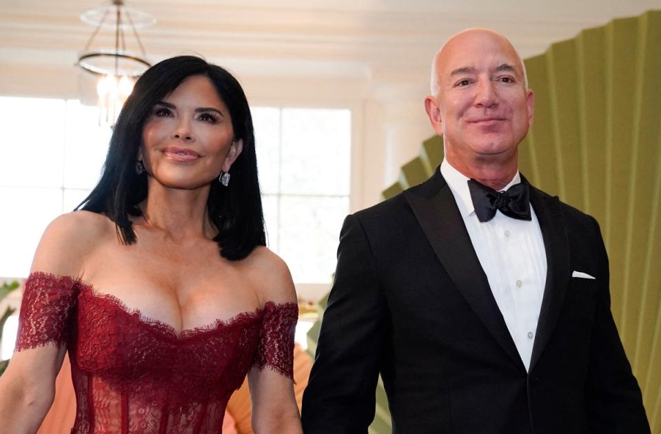 Executive chairman of Amazon Jeff Bezos and actress Lauren Sanchez arrive for a State Dinner in honour of Japanese Prime Minister Fumio Kishida, at the Booksellers Room of the White House in Washington, DC, on 10 April 2024 (AFP via Getty Images)