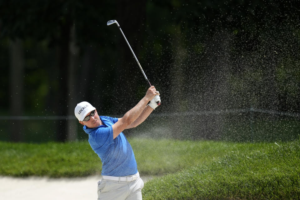 Jonas Blixt, of Sweden, hits out of a bunker on the18th hole during the first round of the John Deere Classic golf tournament, Thursday, July 6, 2023, at TPC Deere Run in Silvis, Ill. (AP Photo/Charlie Neibergall)