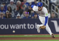 Toronto Blue Jays third basemen Ernie Clement fields a ground out by Seattle Mariners' Mitch Garver during the seventh inning of a baseball game in Toronto, Wednesday, April 10, 2024. (Nathan Denette/The Canadian Press via AP)