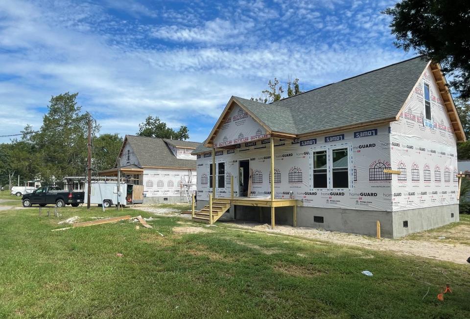 New houses being built on the sight of the former Trent Motel are a sign of Pollocksville's steady recovery since Hurricane Florence.