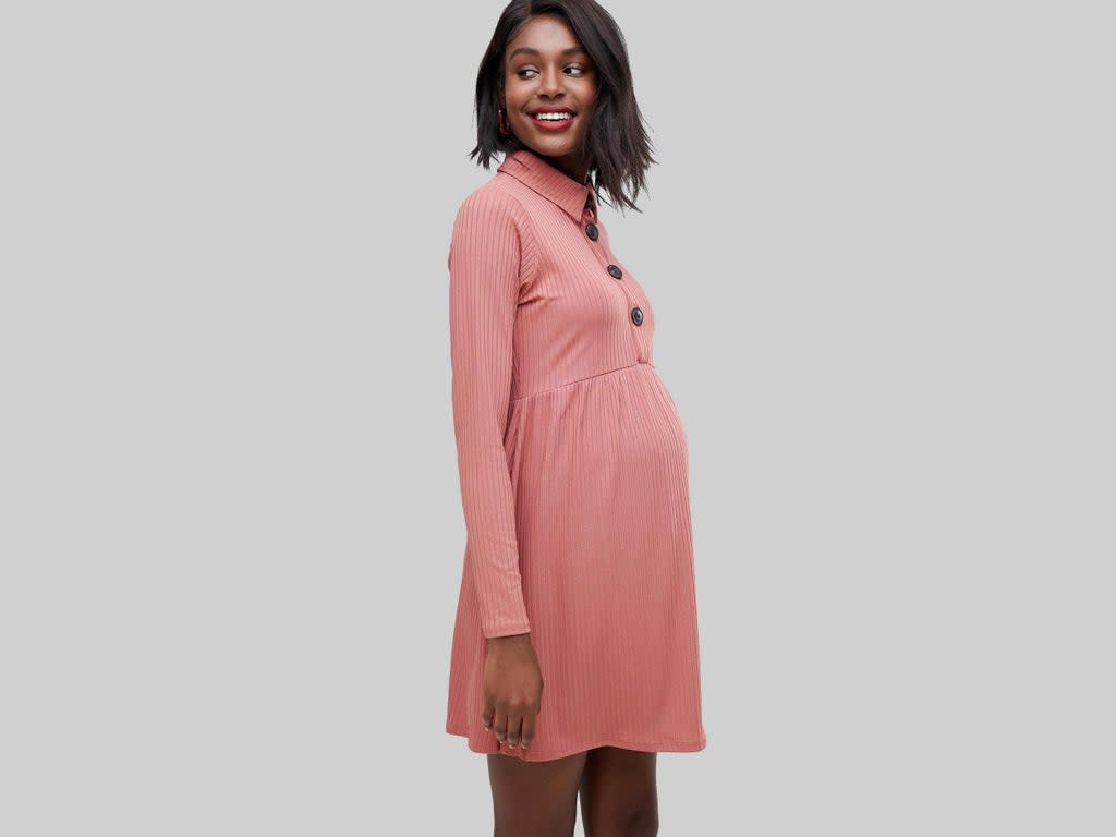 Alongside leggings, maternity jeans and a long silk scarf (useful for discreet feeding afterwards), investing in some easy to wear yet still elegant maternity dresses should see you through (Asos)