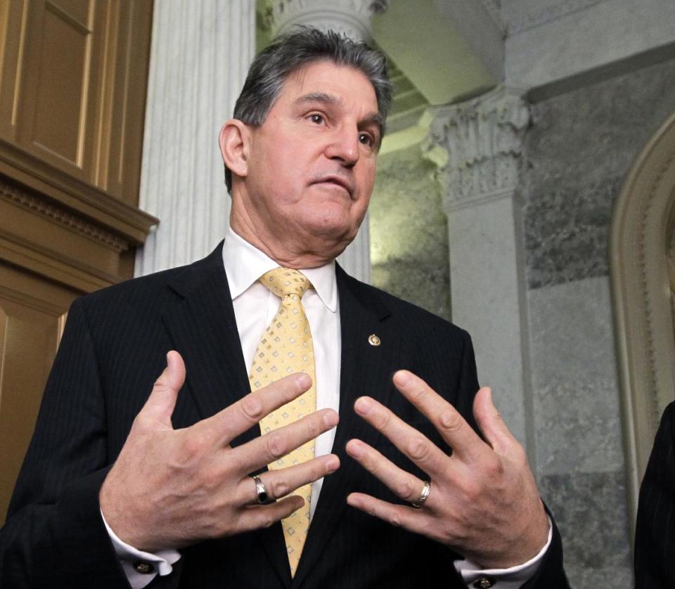 FILE - In this Dec. 17, 2011 file photo, Sen. Joe Manchin, D-W.Va. speaks on Capitol Hill in Washington. Friends of coal are certain they know the enemy. They point to President Barack Obama and his Environmental Protection Agency, arguing that the administration’s new clean air rules dealt a devastating blow to a multibillion-dollar industry that has been the lifeblood of Appalachia for generations. The standards imposed earlier this year tightened limits on existing coal powered-plant emissions; agency guidelines on restricting greenhouse gases could affect new plants as early as 2013. (AP Photo/J. Scott Applewhite, File)