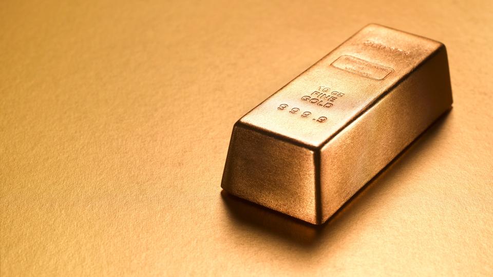 Gold ingot with gold copy space