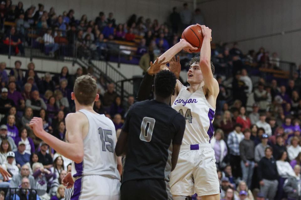 Canyon’s Kemper Jones (14) shoots the ball  in a District 4-4A game against Randall, Tuesday, January 31, 2023, at Canyon High School, Canyon, Tx.  Canyon won 62-47.
