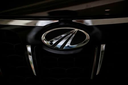 FILE PHOTO - The logo of Mahindra and Mahindra is seen on a car at a showroom in Mumbai, India, August 30, 2016. REUTERS/Danish Siddiqui/File Photo