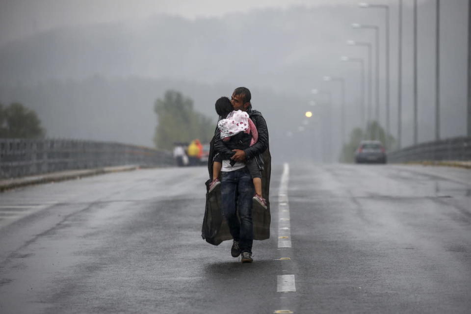 Kissing his daughter