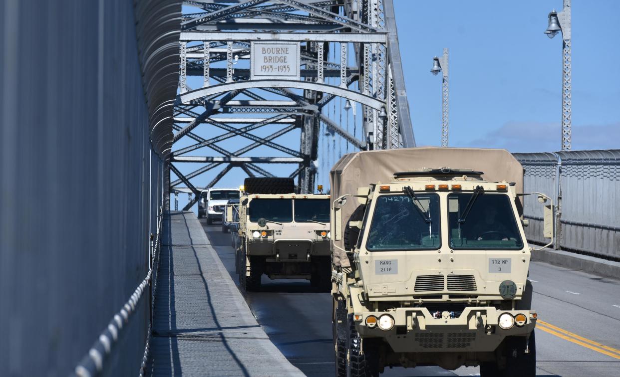 Cars travel over the Bourne Bridge.