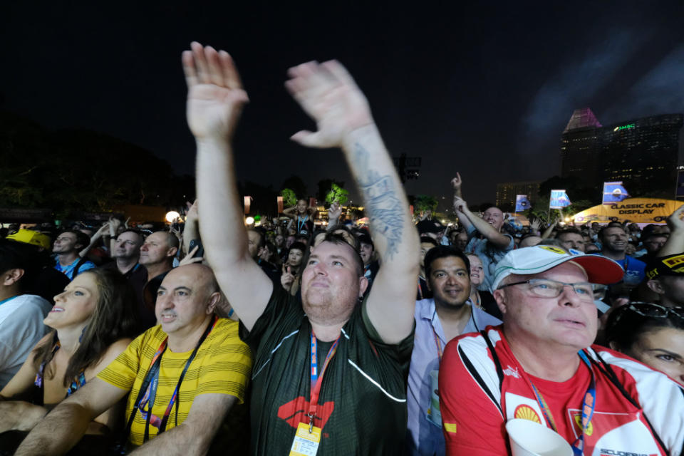 Fans getting into the groove. (PHOTO: Singapore GP)