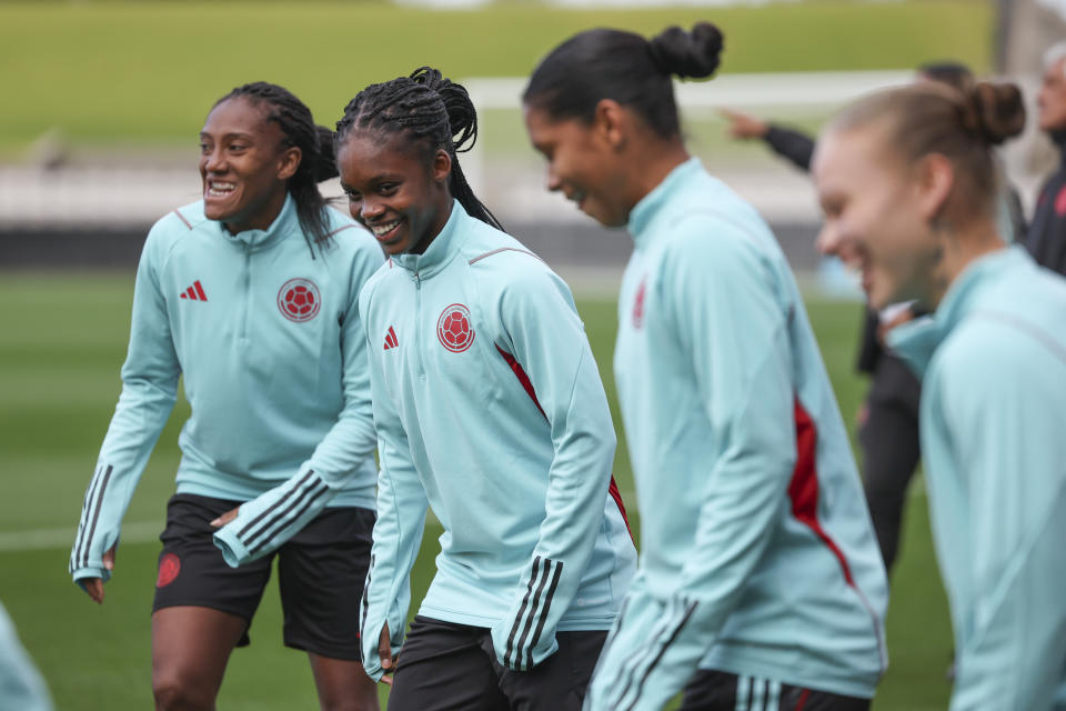 Colombia's forward Linda Caicedo, second left, trains with her teammates in Melbourne, Australia, Monday, July 24, 2023. Caicedo, 18, was diagnosed with ovarian cancer at 15. "I was going into surgery one day and I was feeling really bad," Caicedo said through a translator. "I thought that I was not going to be able to play top-level football again." (AP Photo/Jessica Gratigny)