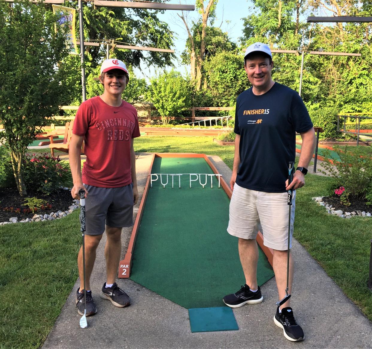 Beechwood 2021 graduate Cole Hetzel, left, and father, Chris Hetzel, are at the Putt-Putt Fun Center in Erlanger, where they will try to set a mark in the Guinness World Record for miniature golf rounds in a 24-hour period July 31-Aug. 1, 2022.