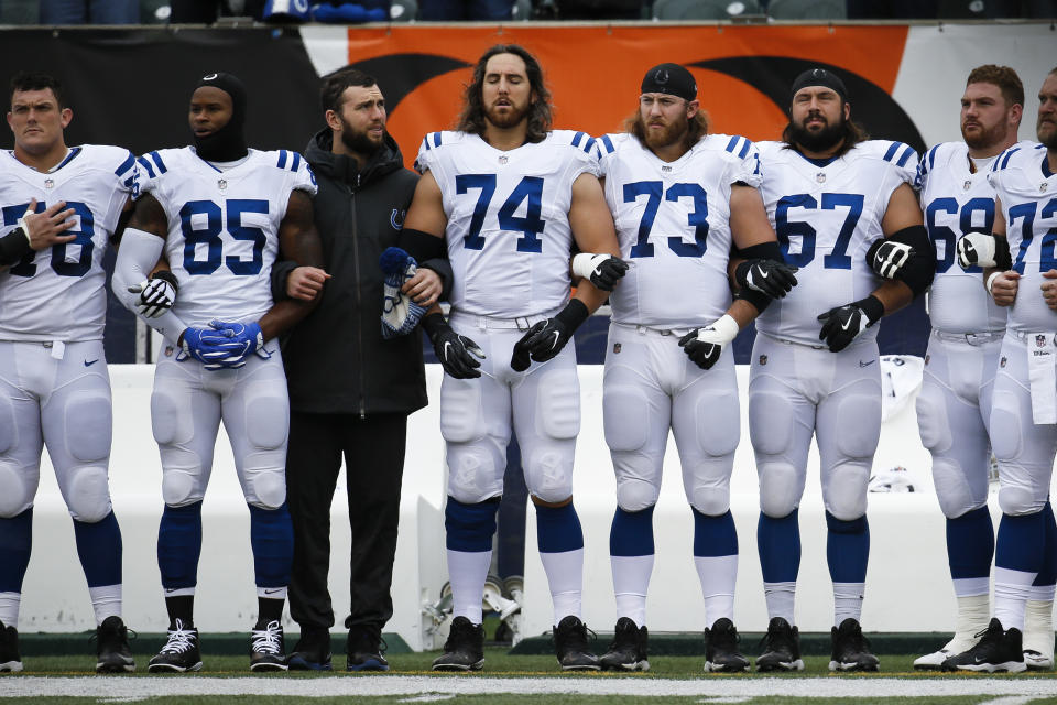 Quuarterback Andrew Luck, third from left, may not be back in uniform with his Colts teammates in 2017. (AP)