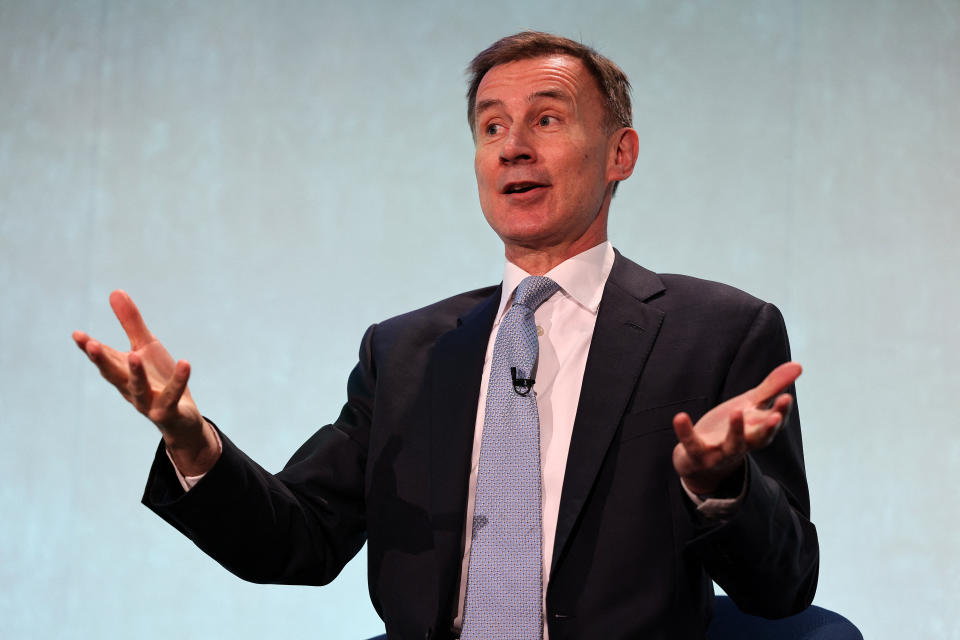 tax year Britain's Chancellor of the Exchequer Jeremy Hunt speaks during a session at the Resolution Foundation Economy 2030 conference in London on December 4, 2023. (Photo by Adrian DENNIS / AFP) (Photo by ADRIAN DENNIS/AFP via Getty Images)