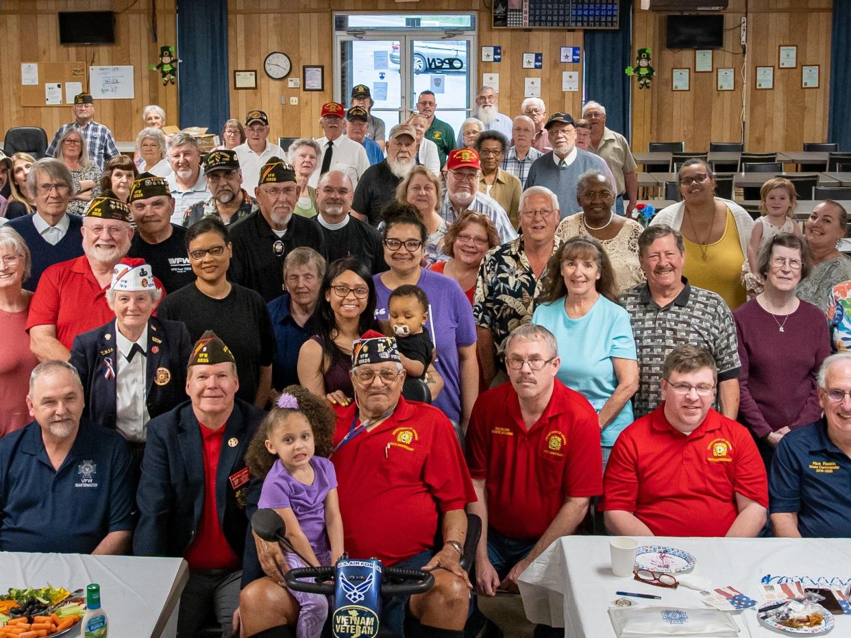 Eugene Chavis, front center, was recently honored for his service to the VFW.