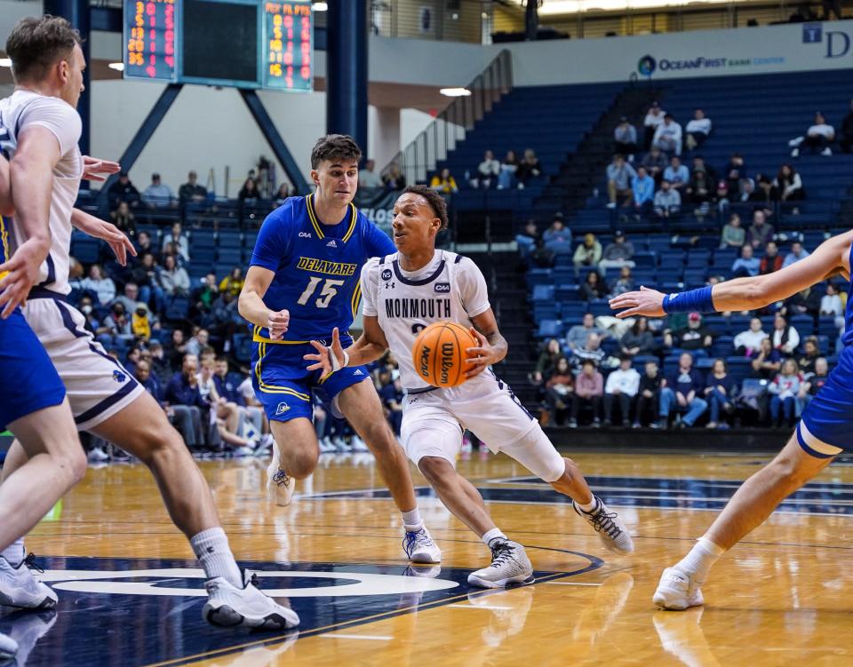 Monmouth's Jakari Spence drives against Delaware at OceanFirst Bank Center in West Long Branch on Feb. 2, 2023.