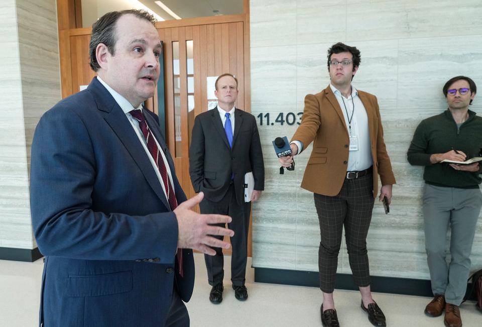Following a 45-minute presentation by litigation attorney TJ Tuner, stopped outside of the courtroom at Travis County Court to answer questions from local journalists on Wednesday, January 31, 2024.