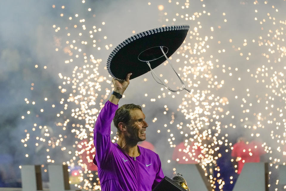 Spain's Rafael Nadal celebrates after defeating Britain's Cameron Norrie in the final match at the Mexican Open tennis tournament in Acapulco, Mexico, Saturday, Feb. 26, 2022. (AP Photo/Eduardo Verdugo)