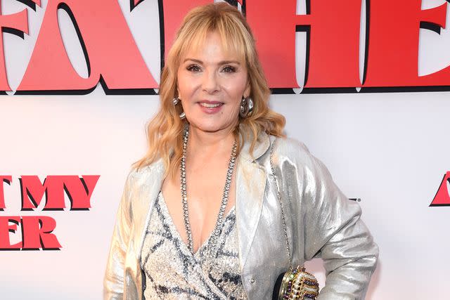 <p>Gary Gershoff/WireImage</p> Kim Cattrall attends the "About My Father" New York premiere on May 9, 2023