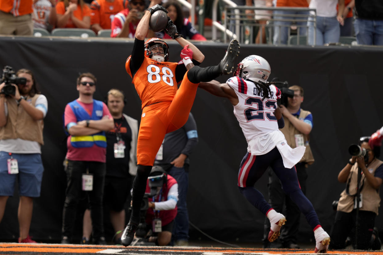 New England Patriots safety Kyle Dugger (23) breaks up a pass intended for Cincinnati Bengals tight end Mike Gesicki (88) during the first half of an NFL football game, Sunday, Sept. 8, 2024, in Cincinnati. (AP Photo/Carolyn Kaster)