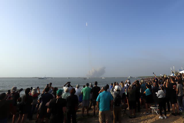 Thom Baur/UPI/Shutterstock Crowd gathers to watch SpaceX Starship launch
