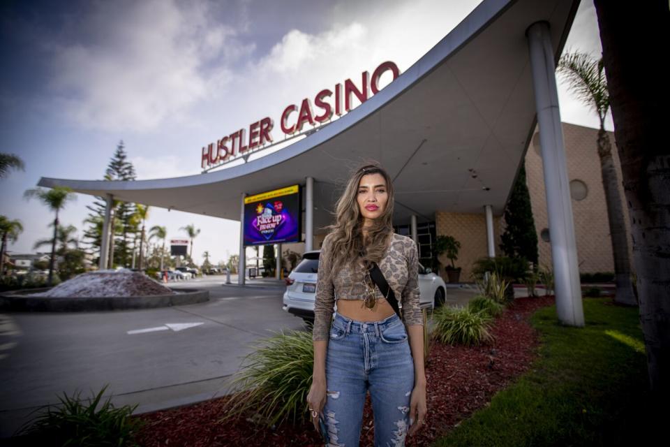 Robbi Jade Lew stands outside Hustler Casino.