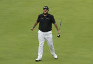 Ireland's Shane Lowry reacts after putting on the 18th green during the third round of the British Open Golf Championships at Royal Portrush in Northern Ireland, Saturday, July 20, 2019.(AP Photo/Matt Dunham)