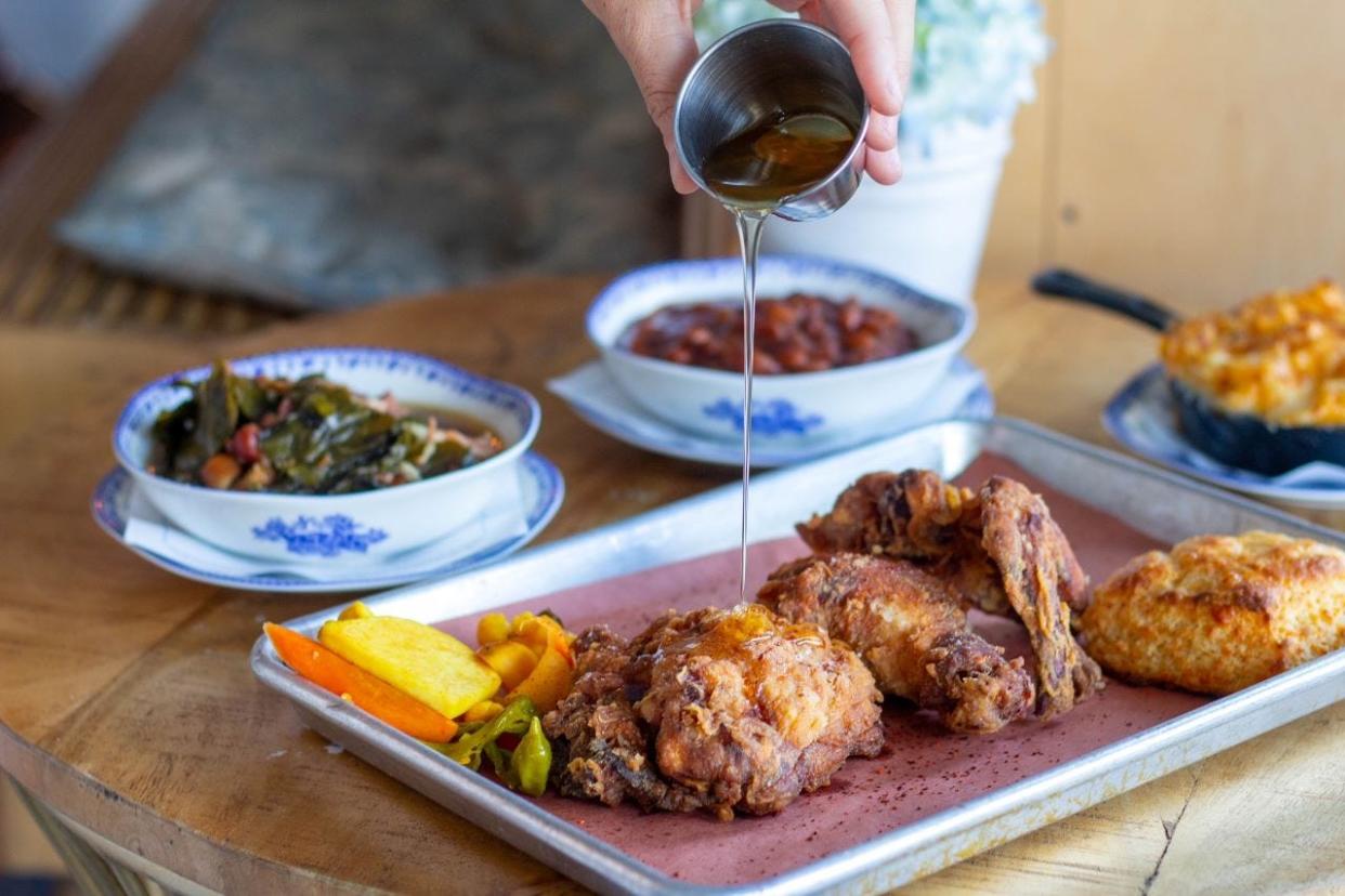 The fried chicken dinner is a top-selling menu item at Sassafras Southern restaurant in downtown West Palm Beach.