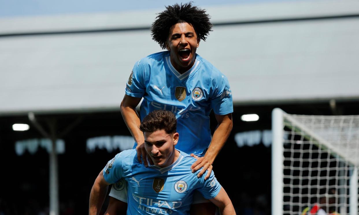 <span>Julián Álvarez (below) celebrates scoring the fourth goal with Rico Lewis.</span><span>Photograph: Tom Jenkins/The Observer</span>