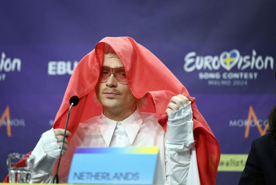 Joost Klein representing the Netherlands gestures, during a press conference after the second semi-final of the Eurovision Song Contest, at the Malmo Arena, in Malmo, Sweden, Thursday, May 9, 2024. Hours before the final, Dutch contestant Joost Klein was dramatically booted out by organizers over a backstage incident. He had failed to perform at two dress rehearsals on Friday, and contest organizer the European Broadcasting Union said it was investigating an “incident.” (Jessica Gow /TT News Agency via AP)