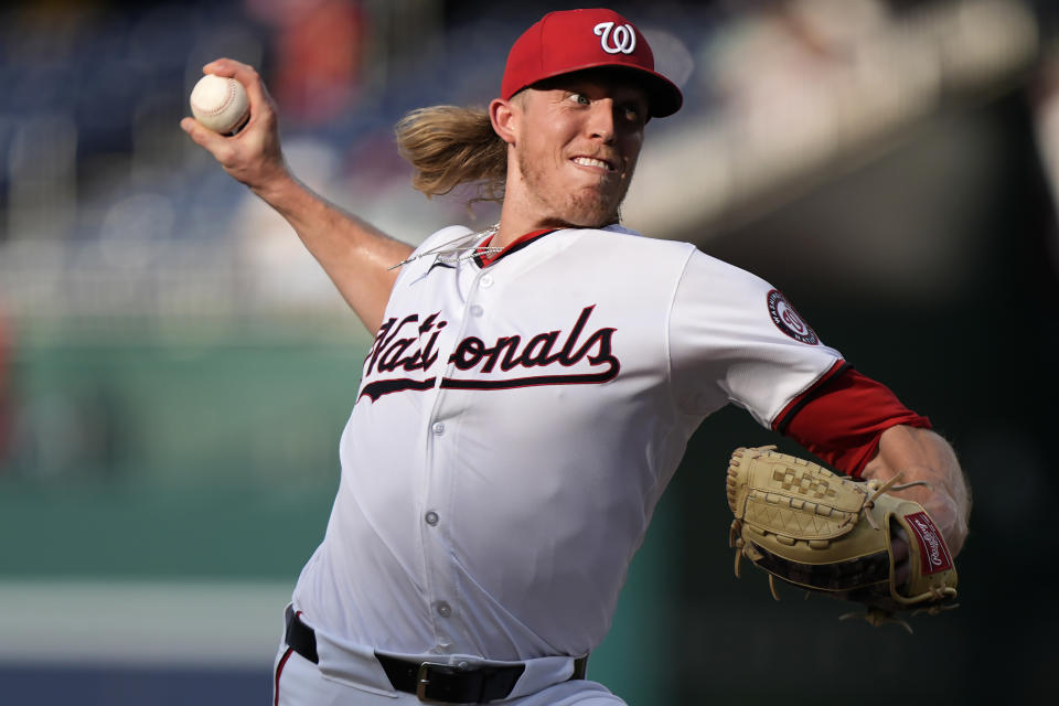 Washington Nationals pitcher Jordan Weems throws during a baseball game against the St. Louis Cardinals at Nationals Park, Saturday, July 6, 2024, in Washington. The Nationals beat the Cardinals, 14-6. (AP Photo/Mark Schiefelbein)