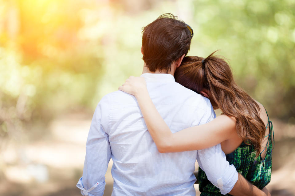 Young couple rear view