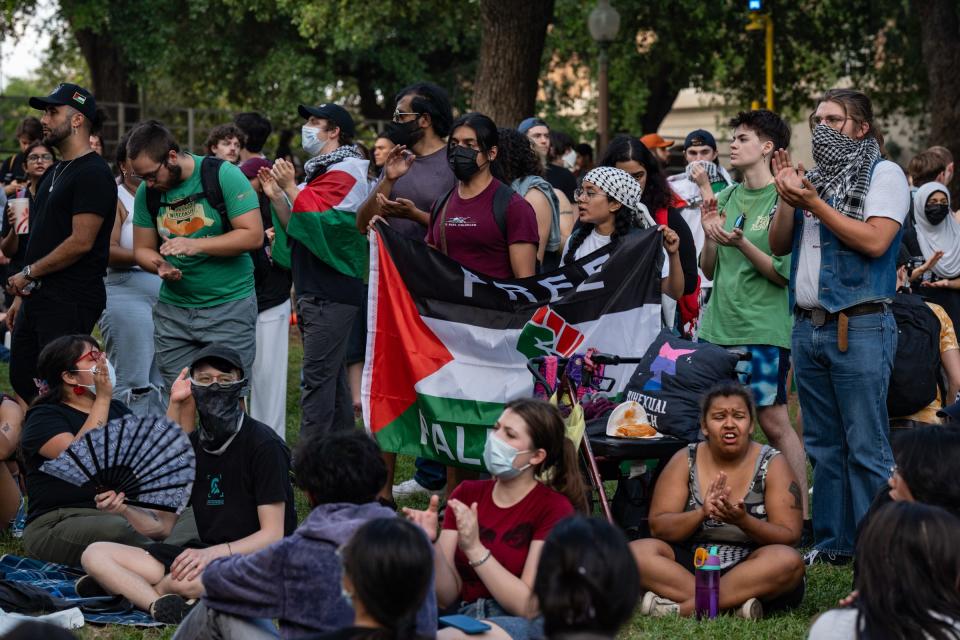 Protesters chant during a pro-Palestinian protest at the University of Texas Wednesday April 24, 2024.