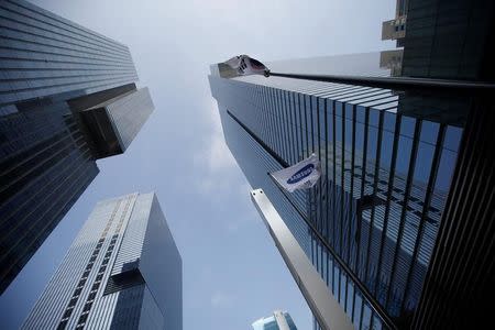 A building of Samsung Electronics (R) is seen in Seoul, South Korea, November 8, 2016. REUTERS/Kim Hong-Ji