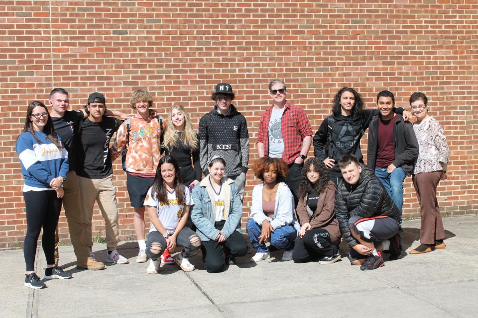 (Back row, left to right) SCVTHS English Instructor Brittany Maldonado, SCVTHS students James Marvits of Hillsborough, Luke Donnadio of Hillsborough, Jacob McNerney of Flagtown, Kalina Trent of Skillman, Scott Landers of Somerset; author of "The Warehouse" Rob Hart, Joshua Morris of Manville, Joshua Ortiz of South Bound Brook, SCVTHS Supervisor of Academics Teresa Morelli. (Front row, left to rightr) Emily Rosalli of Hillsborough, Makayla Long of Bound Brook, Sanaia Harrison of Hillsborough, Olivia Jaime of Manville, and Kyle Smith of Somerset pose for a photo outside the auditorium before the author’s presentation.