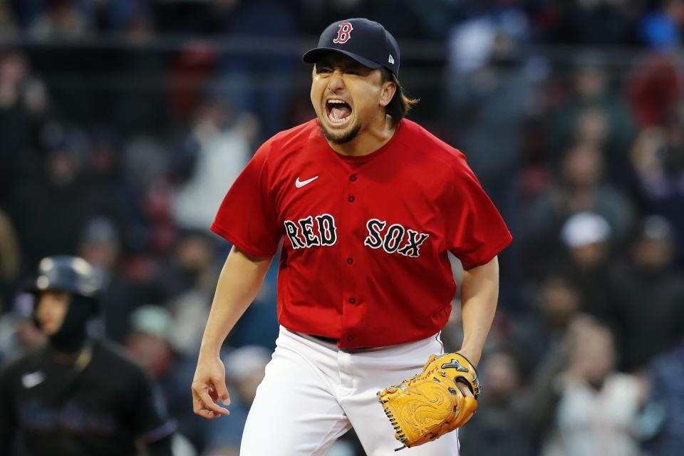 Boston Red Sox's Hirokazu Sawamura reacts after striking out Miami Marlins' Jose Devers to retire the side during the eighth inning of a baseball game, Saturday, May 29, 2021, in Boston. (AP Photo/Michael Dwyer)