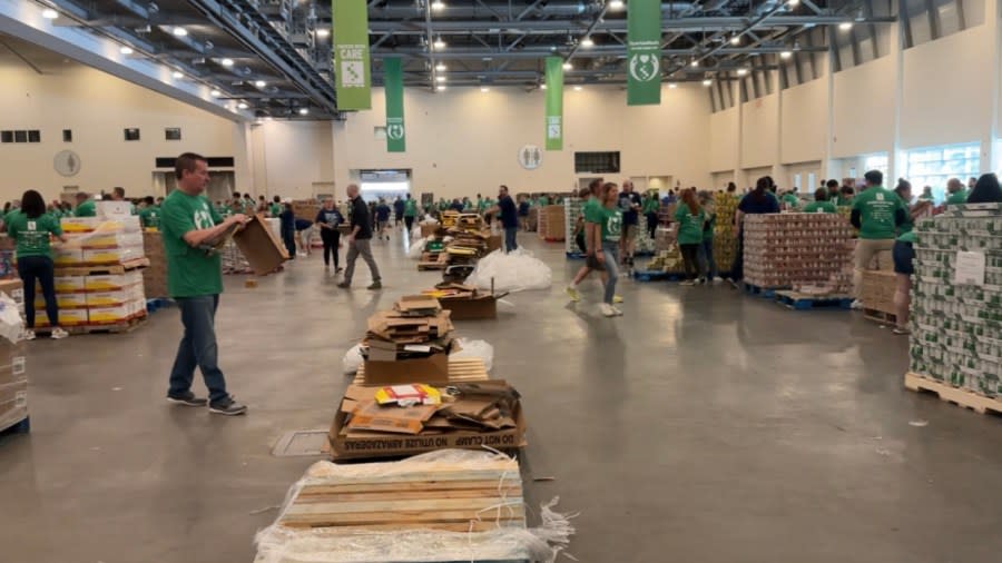 Volunteers packed donations of food on June 6, 2024, for SpartanNash's ninth annual Helping Hands Day.