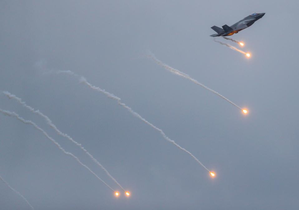 A USAF F-35 drops flares while practicing Friday, April 21 before Saturday's 2023 Thunder Over Louisville.