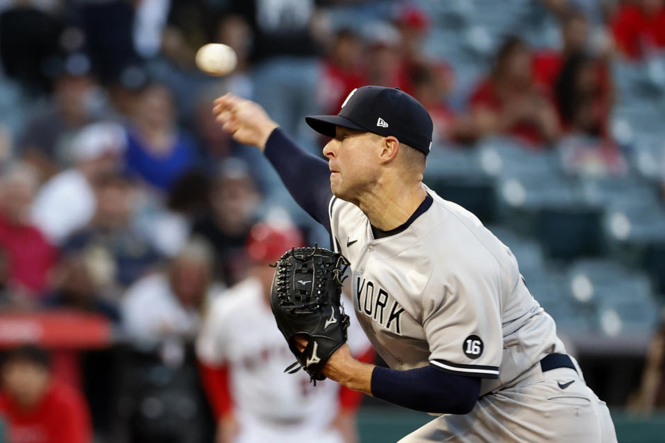 New York Yankees' Corey Kluber throws to a Los Angeles Angels batter during the first inning of a baseball game in Anaheim, Calif., Monday, Aug. 30, 2021. (AP Photo/Ringo H.W. Chiu)