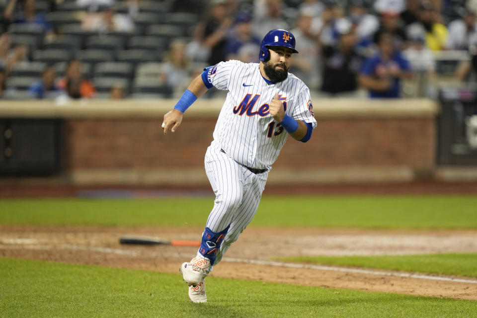 New York Mets' Luis Guillorme rounds the bases after hitting a walk-off RBI single during the tenth inning of a baseball game against the Los Angeles Dodgers at Citi Field, Sunday, July 16, 2023, in New York. The Mets defeated the Dodgers in extra innings 2-1. (AP Photo/Seth Wenig)