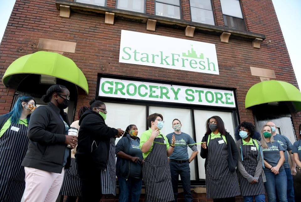 Miles Hoover (speaking center), Grocery Store Development Coordinator helps kick off the opening of StarkFresh Grocery Store which opened with a celebration in the  Food Justice Campus in Canton.  Tuesday, October, 06 2020.