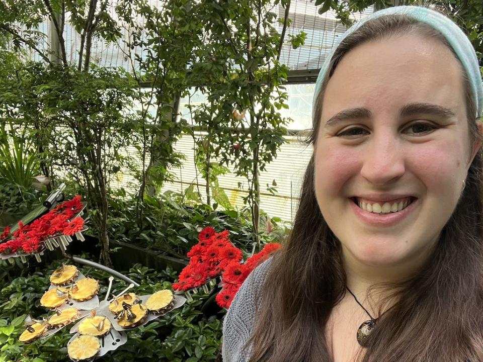 The author standing in the butterfly garden at Singapore's Changi International Airport.