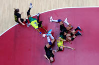 <p>TOKYO, JAPAN - JULY 31: Ana Paula Rodrigues Belo of Team Brazil shoots for goal past Elin Hansson of Team Sweden as Eduarda Amorim Taleska of Team Brazil, Linn Blohm and Jamina Roberts of Team Sweden fall to the ground during the Women's Preliminary Round Group B handball match between Brazil and Sweden on day eight of the Tokyo 2020 Olympic Games at Yoyogi National Stadium on July 31, 2021 in Tokyo, Japan. (Photo by Dean Mouhtaropoulos/Getty Images)</p> 