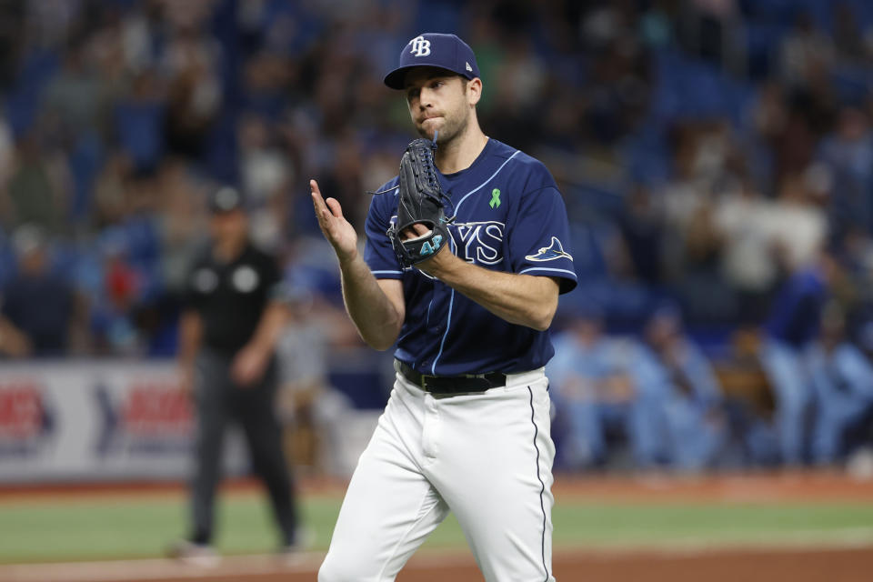 Tampa Bay Rays pitcher Jason Adam reacts after defeating the Toronto Blue Jays in a baseball game Friday, May 13, 2022, in St. Petersburg, Fla. (AP Photo/Scott Audette)