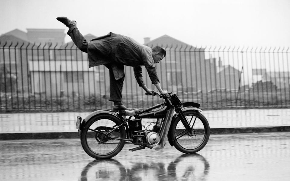 Riding high: an Excelsior motorcycle test in Birmingham in 1931, by James Jarché