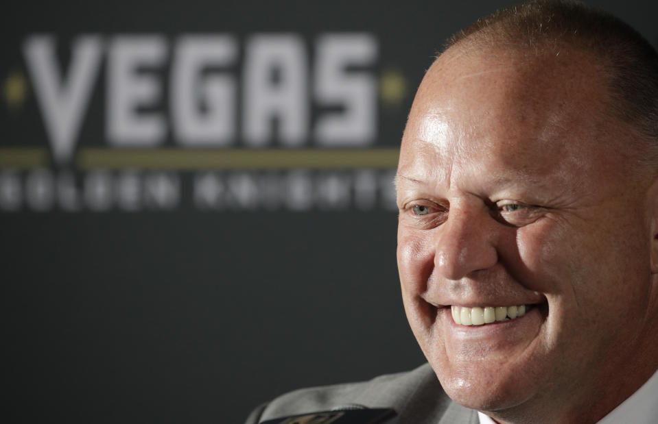 Gerard Gallant listens during a news conference Thursday, April 13, 2017, in Las Vegas. The Vegas Golden Knights have hired Gallant as the first coach of the NHL expansion team. (AP Photo/John Locher)