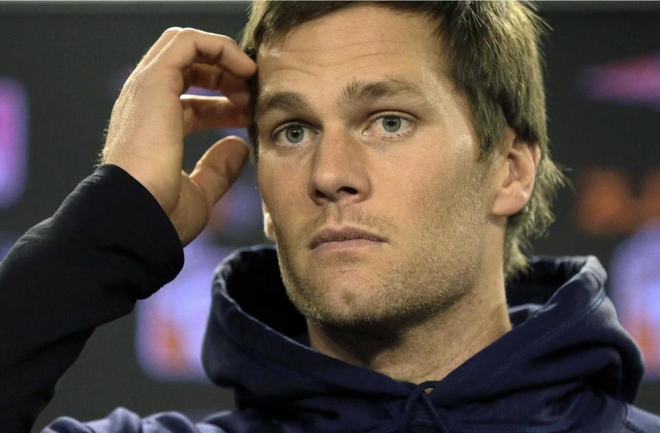 Tom Brady says he won’t fight the NFL over deflate-gate anymore. (AP)