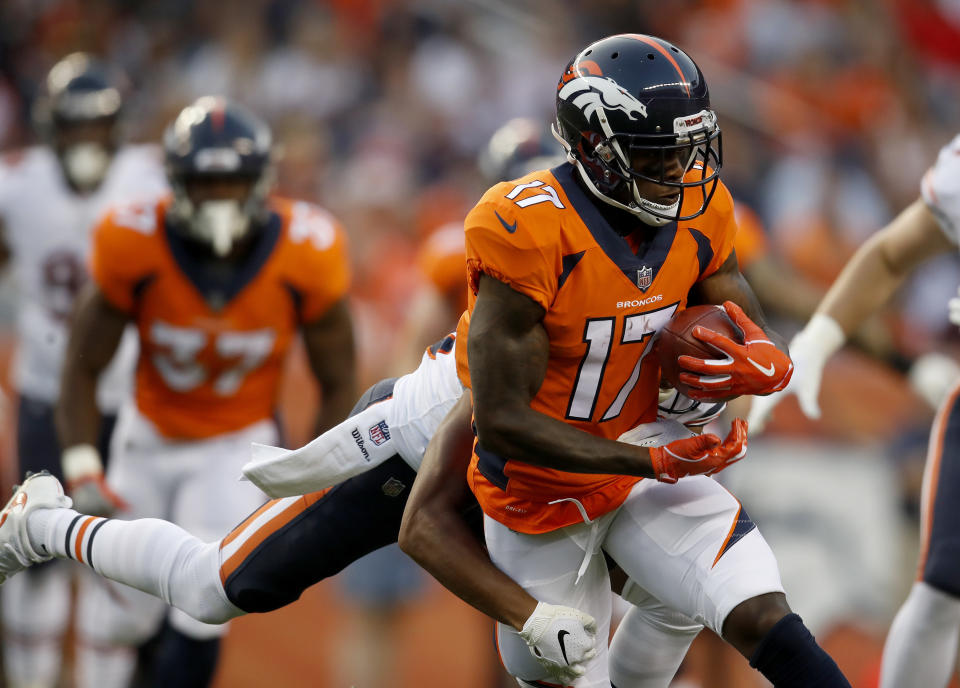 Denver Broncos wide receiver DaeSean Hamilton (17) is hit against the Chicago Bears during the first half of a preseason NFL football game, Saturday, Aug. 18, 2018, in Denver. (AP Photo/David Zalubowski)